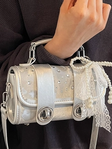 Silver metallic crossbody bag with sparkling rhinestones, pearl chain and lace bow