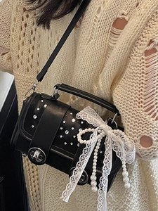 Chic black studded leather beach bag with lace bow and pearl chain accessories