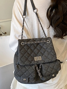 Chic quilted denim backpack with silver chain straps and diamond stitching detail