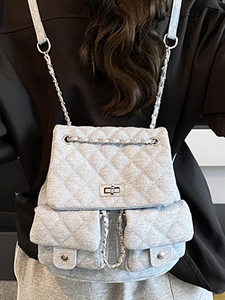 Chic light gray quilted denim backpack with silver chain straps and flap pockets