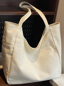 Cream white canvas tote bag with large capacity for commuting and school use