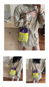 Close-up of vibrant drawstring bucket bag showing purple and neon yellow nylon details