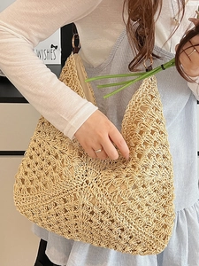 Large capacity beige woven straw tote bag with round handles for beach or commute