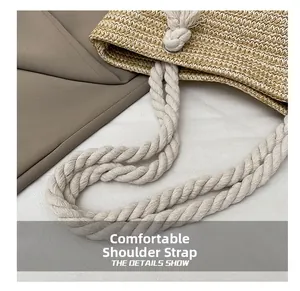Detail of comfortable woven cotton rope shoulder straps on a summer straw tote bag