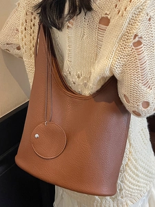 Brown faux leather crescent underarm bag with small round pouch and large capacity