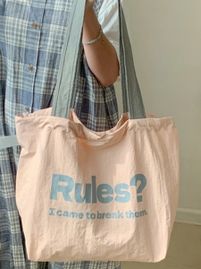 Rosa Canvas-Einkaufstasche mit Aufdruck und grauen Griffen für den Alltag