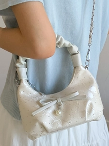Chic cream quilted bucket bag with lace pattern, bow knot, pearl and silver chain strap
