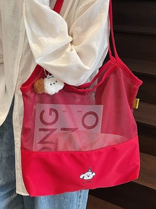 Minimalist red mesh patchwork tote bag featuring a cute cartoon dog print and side tag