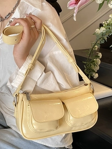 Minimalist light yellow patent leather crossbody bag with dual pockets for women