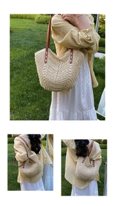 Detailed view of beige woven straw tote bag with brown leather straps on green grass