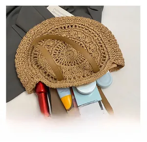 Top view of a woven straw tote bag showing large interior capacity for tablet and cosmetics