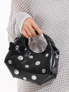 Glossy black crescent handbag with silver studs and crystal bow detail for women