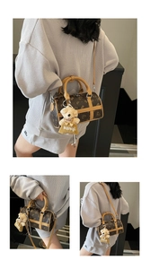 Detailed views of a dark brown boston bag with monogram patterns and a plush bear charm