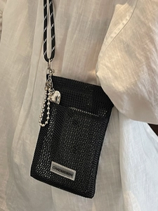 Women's black hollow mesh phone bag with heart charm and woven crossbody strap