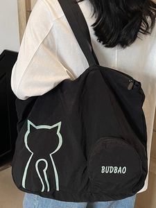 Black large capacity nylon tote bag with green cat outline and round zipper pocket