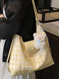 Yellow and white checkered tote bag with cute embroidery and a plush bear pendant