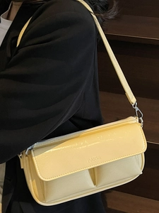 Minimalist creamy yellow baguette bag with Paris engraving and silver metal buckles