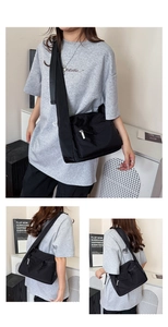 Detail of adjustable strap and front zipper pocket on black nylon messenger crossbody bag