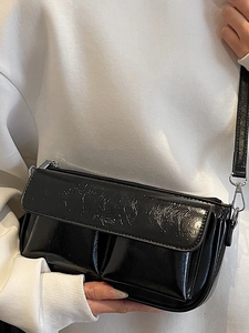 Retro black patent leather baguette shoulder bag with embossed PARIS detail and pleated texture