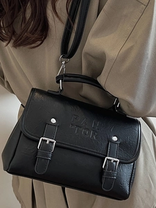 Minimalist black PU leather satchel bag with silver buckles and a wide shoulder strap