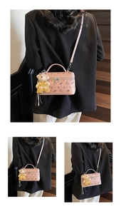 Pink mini box crossbody bag featuring teddy bear prints and a cute plush bear charm pendant
