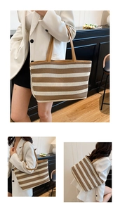 Dettaglio della trama intrecciata e del manico in pelle della grande borsa tote a righe