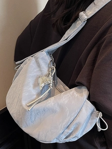 Minimalist light blue pleated crescent shoulder bag for daily commuting and school wear