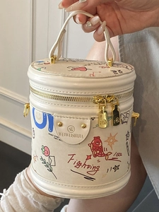 Minimalist bucket bag with graffiti print and top handle for women's daily commute