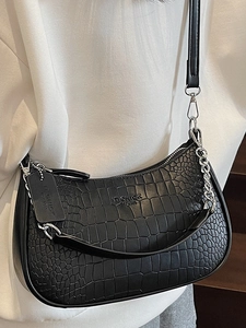 Fashionable black crocodile embossed crescent baguette bag with silver chain for women