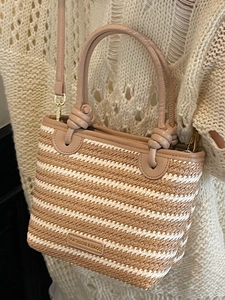 Summer beach straw woven bucket bag with leather handles and striped texture design