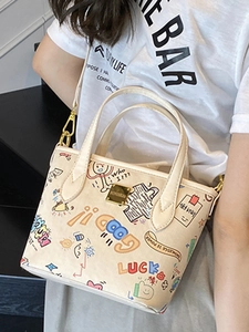 Cute cartoon graffiti tote bag with colorful print and adjustable shoulder strap