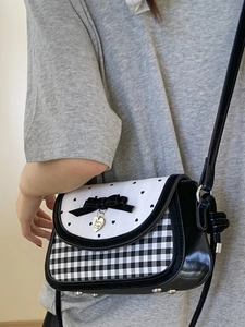Polka dot heart crossbody bag with checkered pattern and bow detail for women