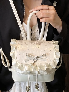 Mini white lace backpack for women with satin ruffles and pearl bow decoration