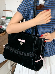 Japanese style black satin pleated tote bag with pink bows and heart pendant detail