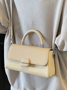 Elegant beige woven crossbody bag with smooth leather flap and stylish round handle