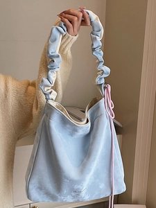 Minimalist sky blue cloud pattern tote bag with ruffled handles and pink drawstring accents