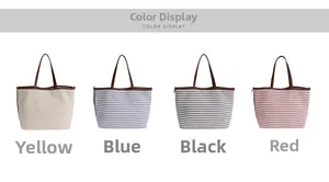 Detail view of large striped canvas tote bags in yellow, blue, black, and red colors
