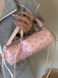 Pink bow cylinder handbag set with pleated fabric and matching small coin purse for women