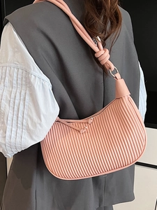 Chic pink pleated hobo bag for women with ruched texture and knot shoulder strap detail