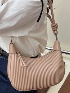 Chic beige pleated hobo shoulder bag with knot strap detail and silver zipper for women