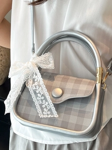 Silver checkered small handbag with large metal handle and lace bow detail for women