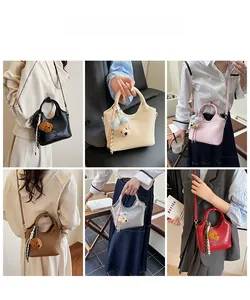 Detailed views of leather bucket bags in six colors with bear charms and scarves