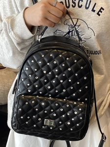 Chic black mini backpack with sparkling rhinestones and quilted pattern for women
