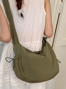 Olive green crescent dumpling bag in lightweight nylon for casual daily commuting