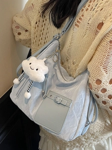 Light blue large tote bag with metallic finish and cute cloud charm for women