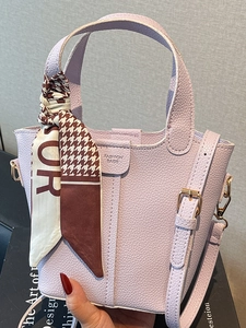 Classic light purple bucket bag with lychee texture leather and a houndstooth silk scarf