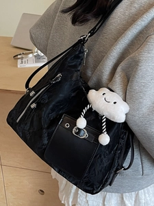 Black large capacity shoulder tote bag with plush cloud charm for daily commute