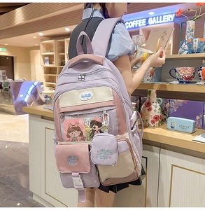 Detailed view of lavender and pink contrast backpack with transparent Ita bag pocket