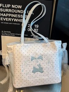 Cute light blue polka dot tote bag with rabbit embroidery and white lace bow detail