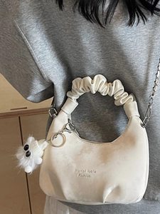 White crescent dumpling bag with pleated cloud handle and silver chain strap